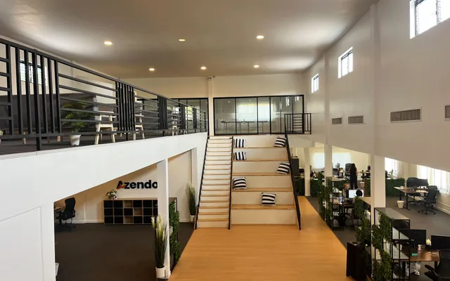 The open-plan Azendo delivery centre in Chiang Mai, Thailand, with its central staircase