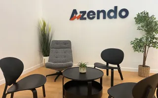 The reception seating area beneath the Azendo logo in the Chiang Mai office