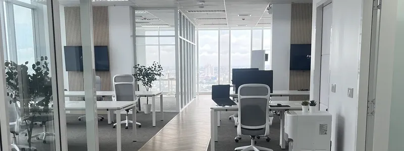 Rows of desks at the Azendo Bangkok office, with the city skyline behind them