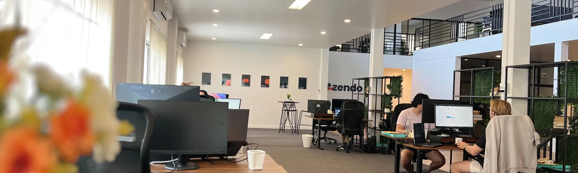 Specialists at their desks in Chiang Mai, where Azendo runs its managed data services