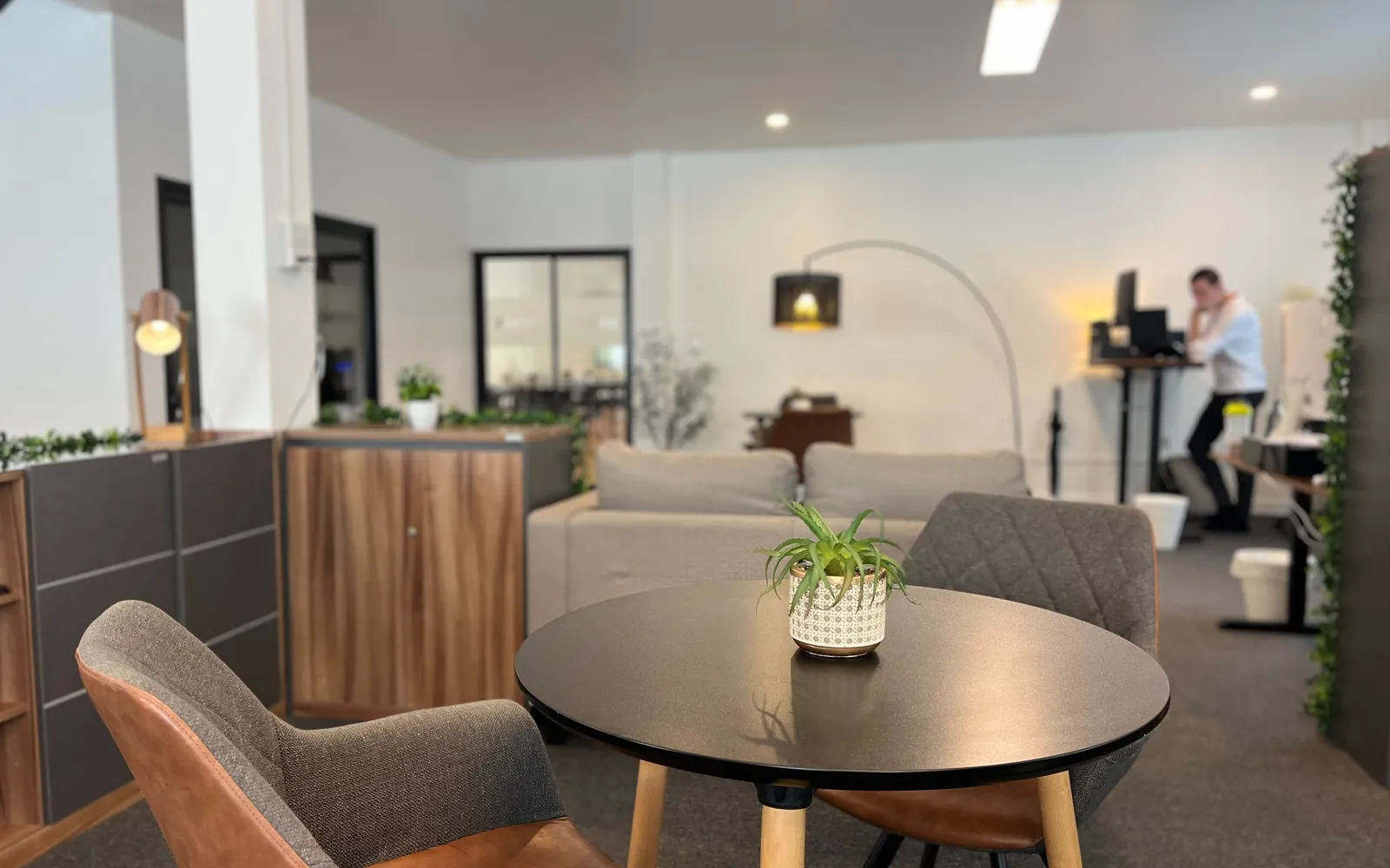 The lounge area and standing desks at the Azendo office in Chiang Mai