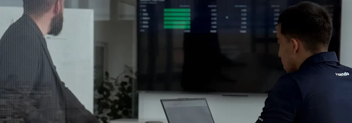 Offshore developers watching a live dashboard in Bangkok, the monitoring a PHP vulnerability fix relies on